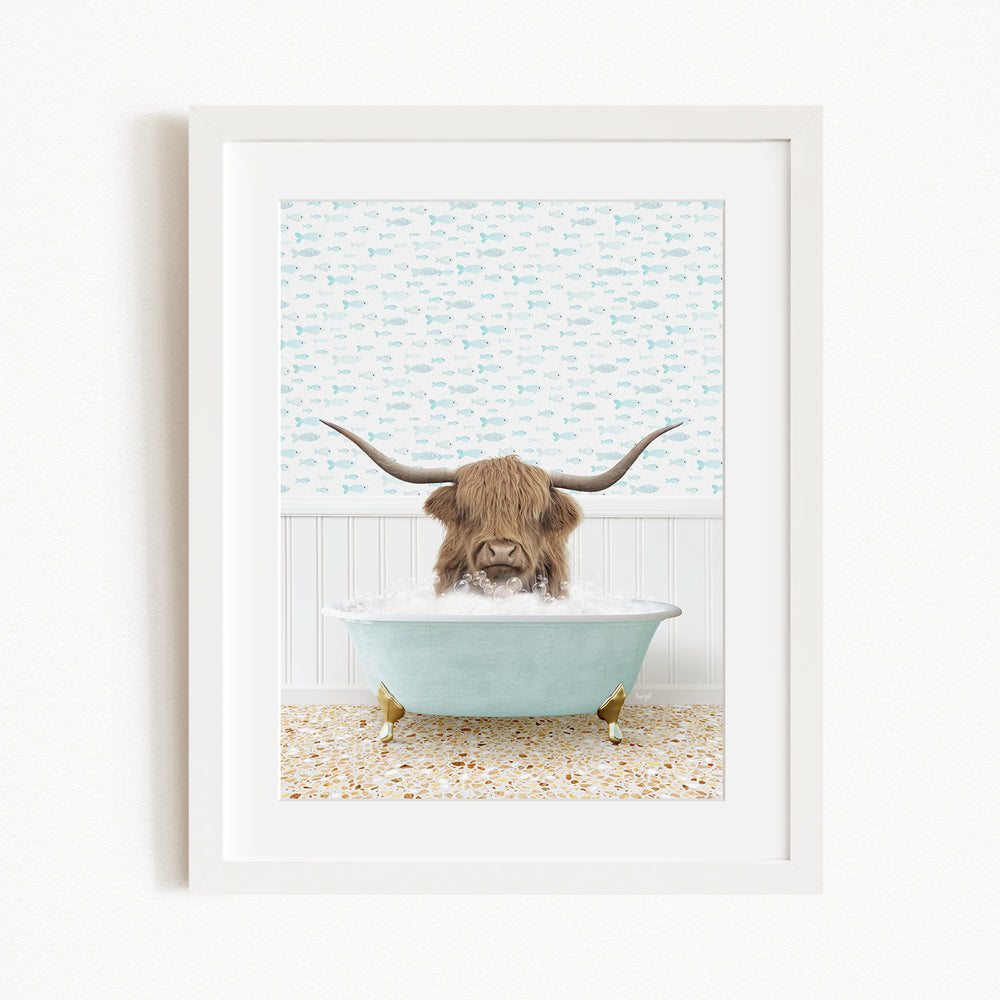 A brown cow with long horns is sitting in a light blue bathtub, surrounded by a patterned wall and a beige floor.