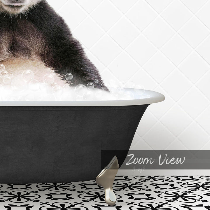 A black bathtub filled with bubbles, with a cat sitting inside and enjoying the bath.