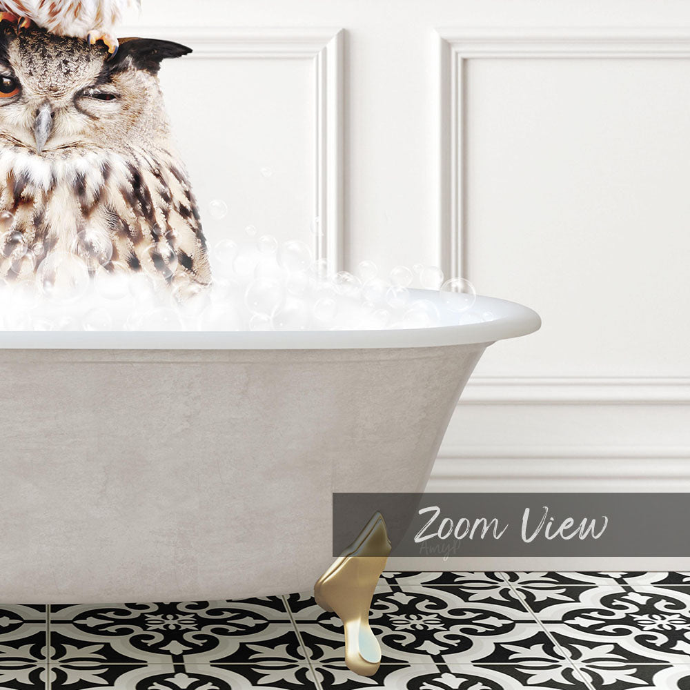 A close-up of an owl sitting in a bathtub filled with bubbles, with a text overlay that reads "Zoom View".
