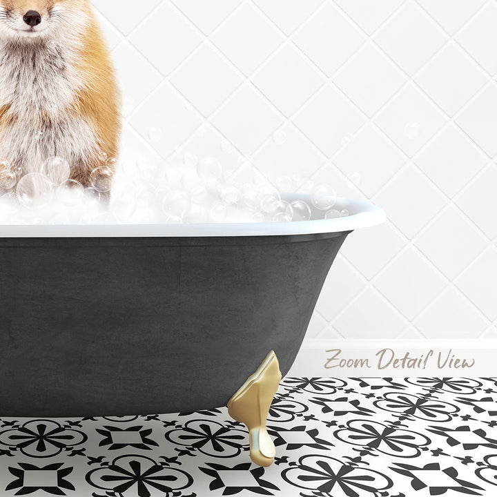 A fluffy orange and white dog is standing in a black bathtub filled with bubbles, with a gold bathtub leg visible on the floor.