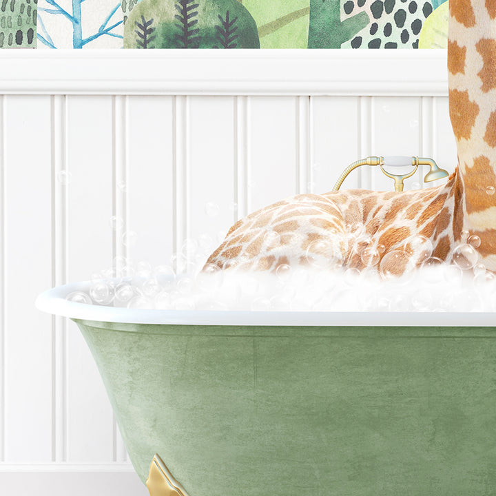 a giraffe laying down in a bathtub filled with foam