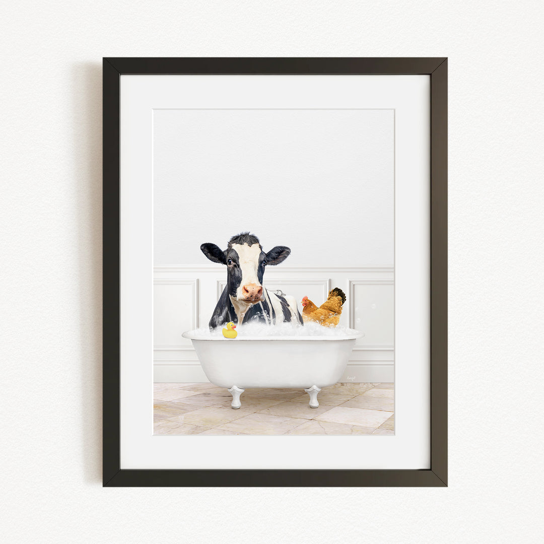 A black and white cow is sitting in a white bathtub, surrounded by a yellow rubber duck and a brown chicken, creating a whimsical and playful scene.