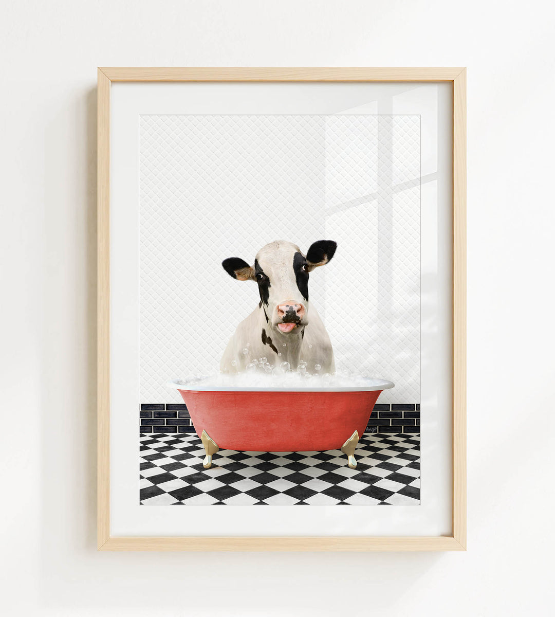 A black and white cow is sitting in a red bathtub filled with bubbles, with a black and white checkered floor beneath it.