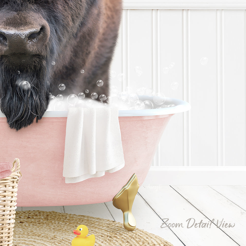 A dog is sitting in a pink bathtub filled with bubbles, surrounded by a yellow rubber duck and a white towel.