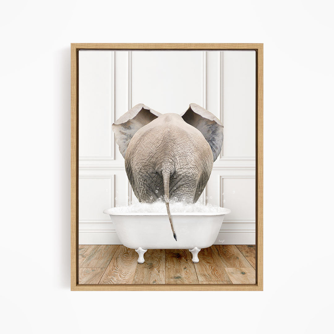 A gray elephant is standing in a white bathtub filled with water, with its trunk submerged in the water.