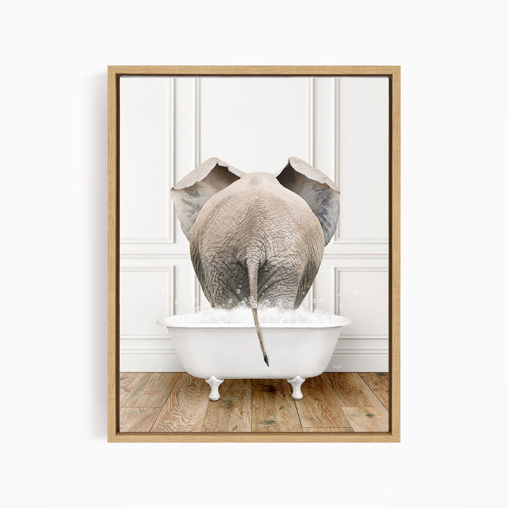 A gray elephant is standing in a white bathtub filled with water, with its trunk submerged in the water.