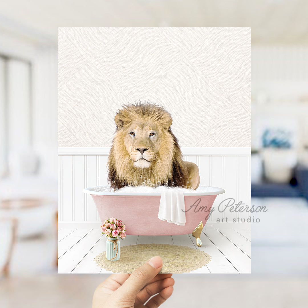 a hand holding a card with a picture of a lion in a bathtub