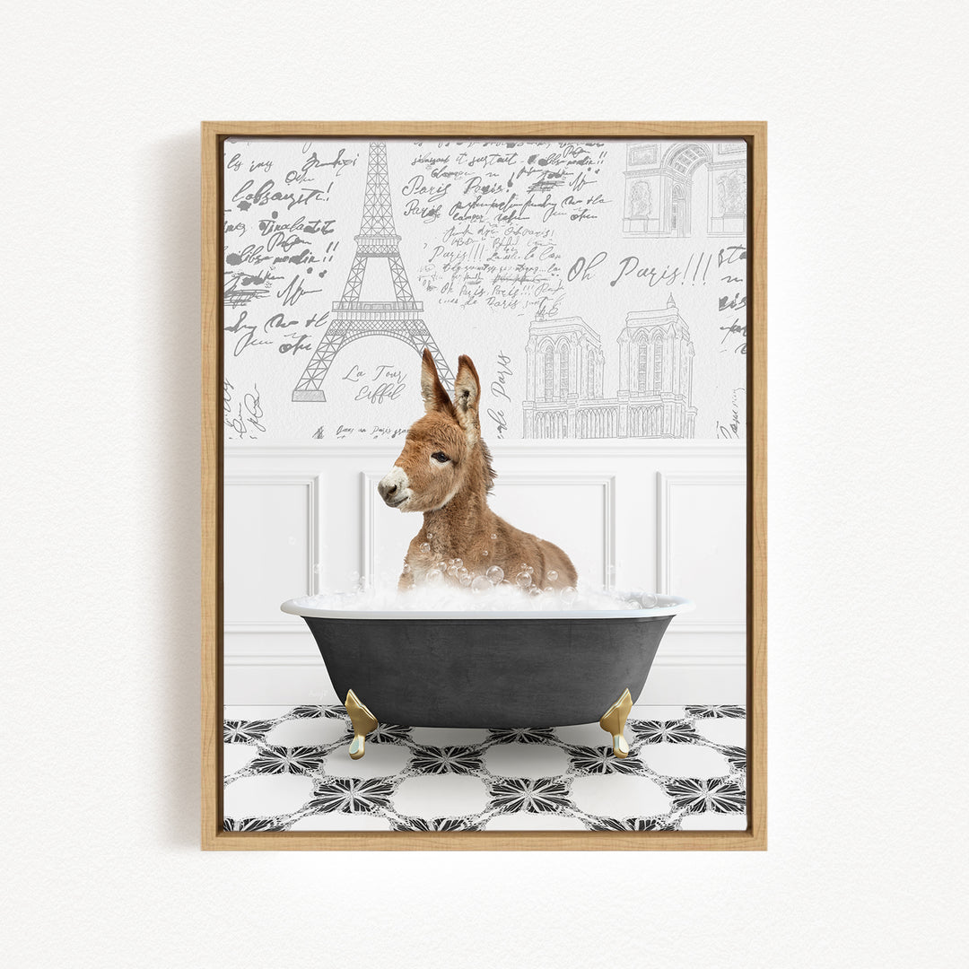 A donkey is sitting in a bathtub filled with bubbles, surrounded by a Paris-themed background with the Eiffel Tower and other Parisian architecture.