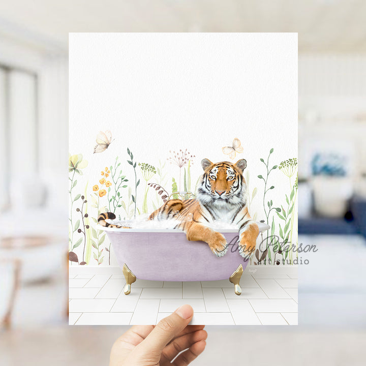 a hand holding up a card with a tiger in a bathtub