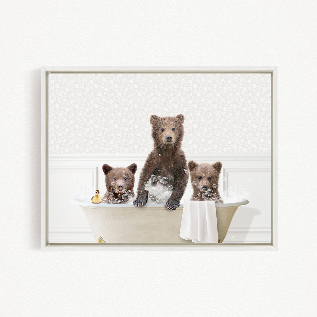 A framed image depicting three bears sitting in a bathtub filled with bubbles, enjoying a relaxing bath.