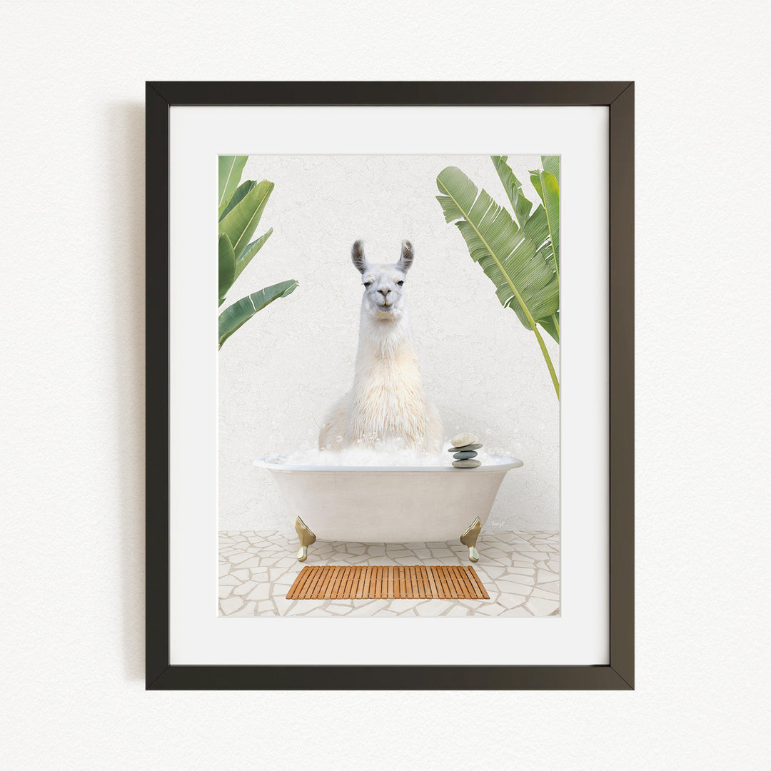 A white llama sitting in a white bathtub, surrounded by green plants, in a framed artwork.