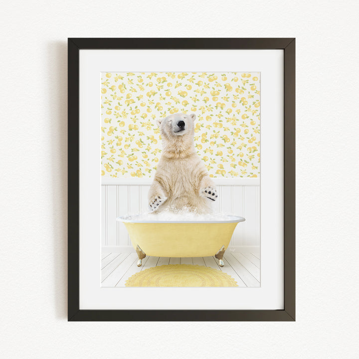 A polar bear sitting in a yellow bathtub, surrounded by a yellow floral pattern on the wall behind it.