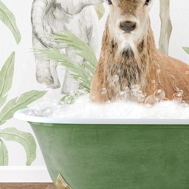 a deer is sitting in a bathtub with bubbles