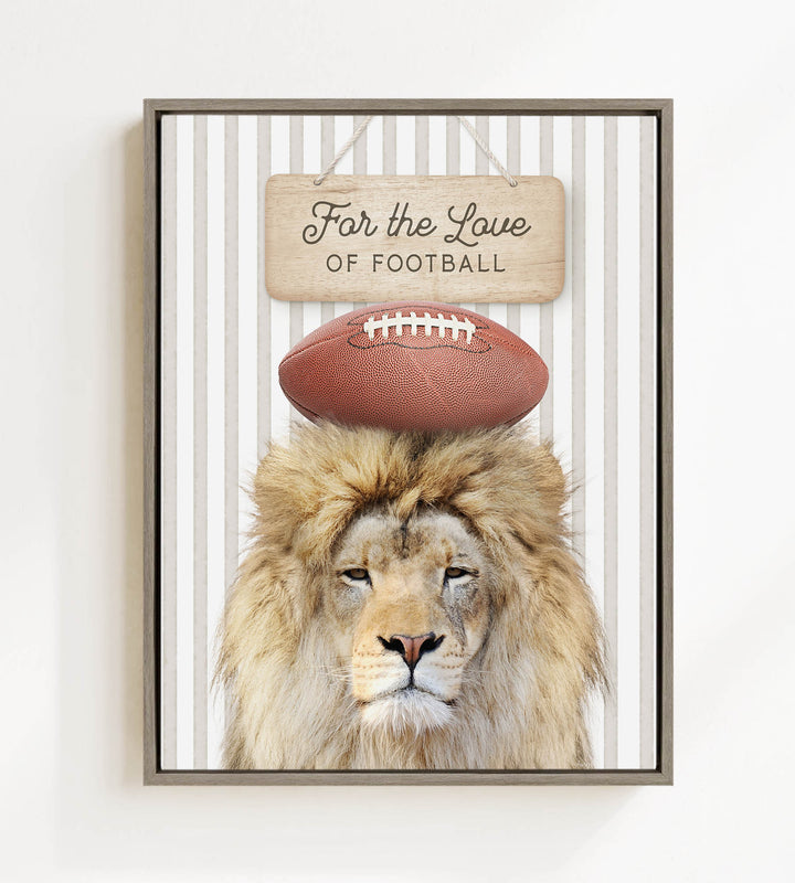A framed image of a lion with a football on its head, accompanied by a wooden sign that reads "For the Love of Football".