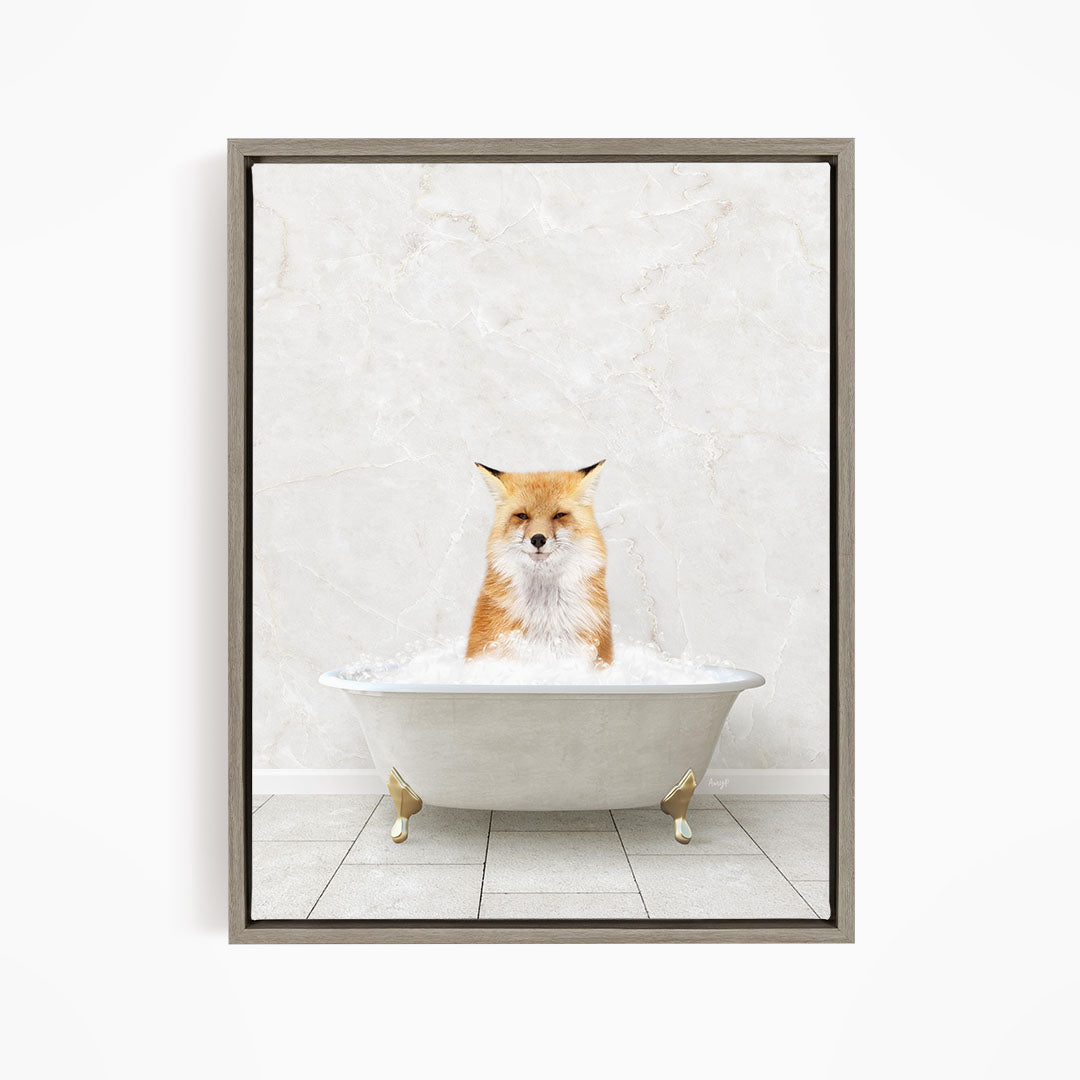 A red fox sitting in a white bathtub filled with water, looking directly at the camera.