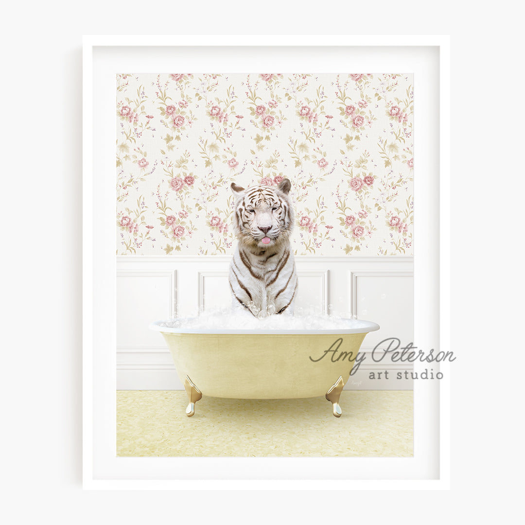 a white tiger is sitting in a bathtub