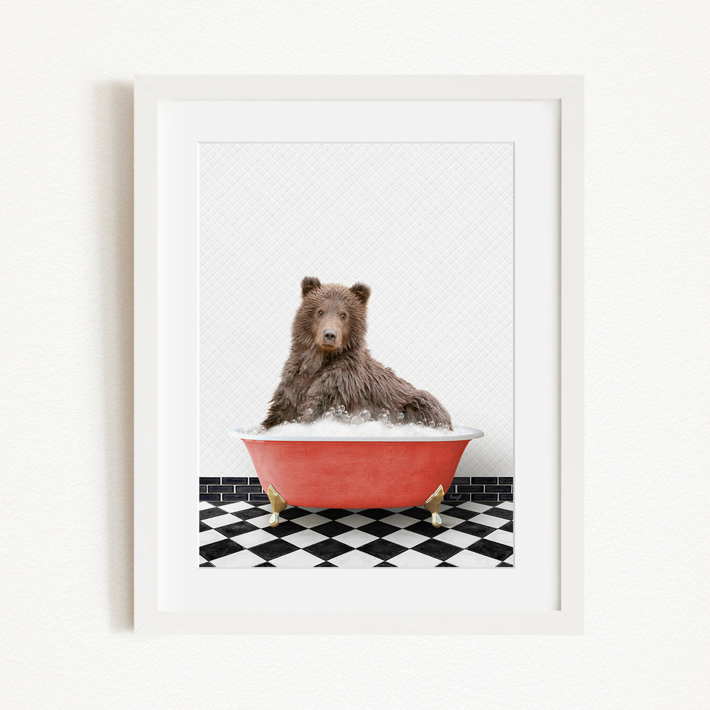 A brown bear sitting in a red bathtub filled with water, surrounded by a black and white checkered floor.