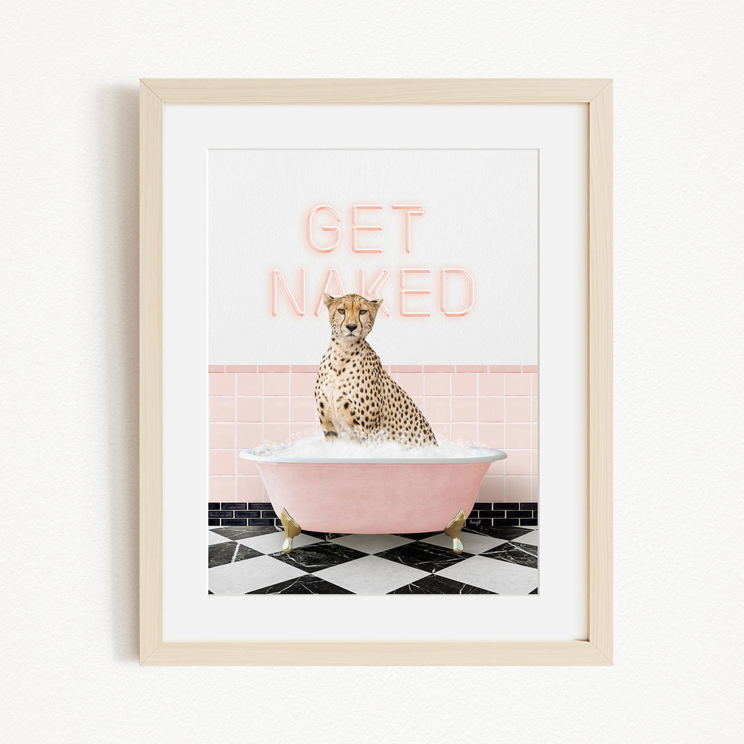 A cheetah sitting in a pink bathtub with the text "GET NAKED" displayed above it.
