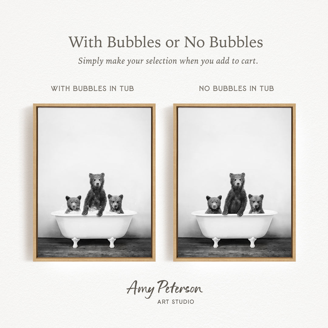 The image is a black and white photograph of three bears sitting in a bathtub, with one bear sitting in the tub and the other two bears sitting on the edge of the tub. The bears are positioned in a way that creates a sense of bubbles or bubbles in the tub.