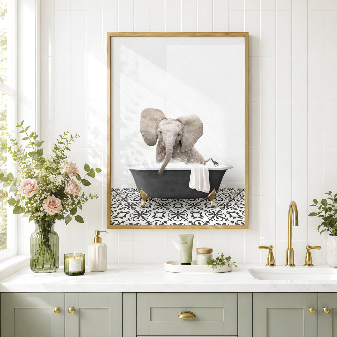 a framed picture of an elephant sitting in a bathtub, surrounded by various bathroom accessories and decor.