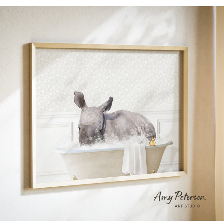 A rhinoceros is sitting in a bathtub filled with bubbles, creating a whimsical and playful scene.