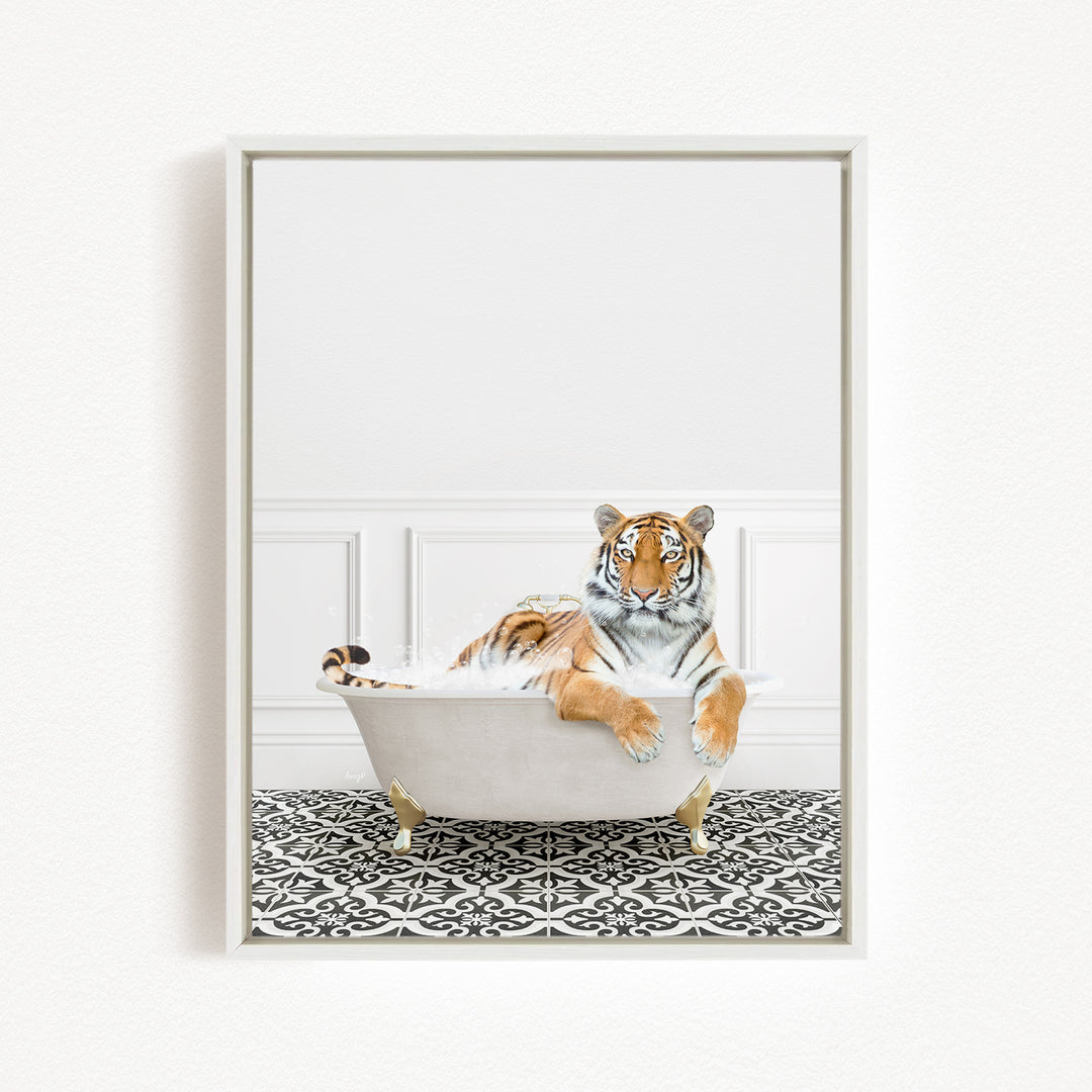 A tiger is sitting in a white bathtub filled with water, surrounded by a black and white patterned floor.