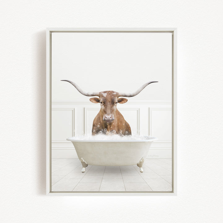 A bull with large horns is sitting in a white bathtub filled with water, creating a whimsical and humorous scene.