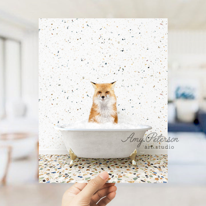 a hand holding up a card with a picture of a dog in a bathtub