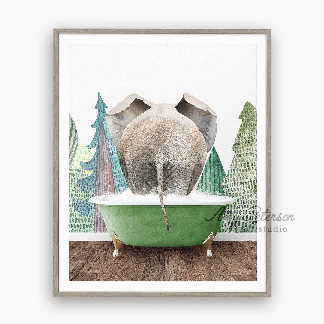 a picture of an elephant taking a bath