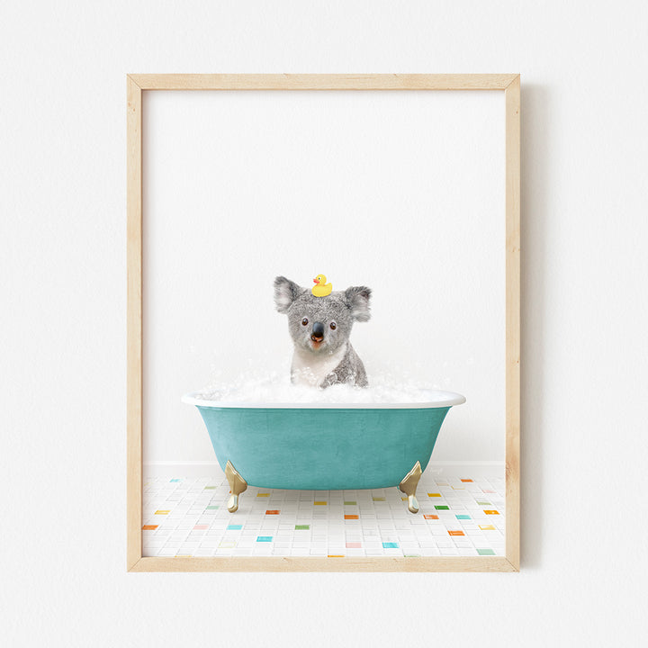 a framed photo of a koala in a bathtub