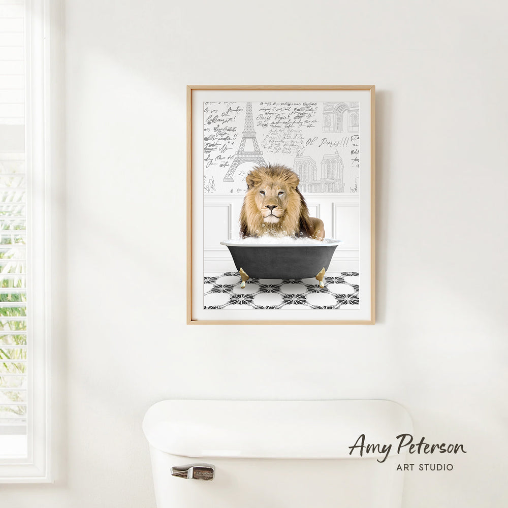 A framed print of a lion sitting in a bathtub, with a drawing of the Eiffel Tower in the background.