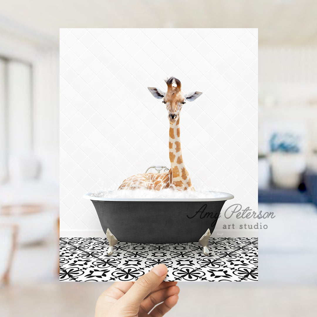 a giraffe is sitting in a bath tub