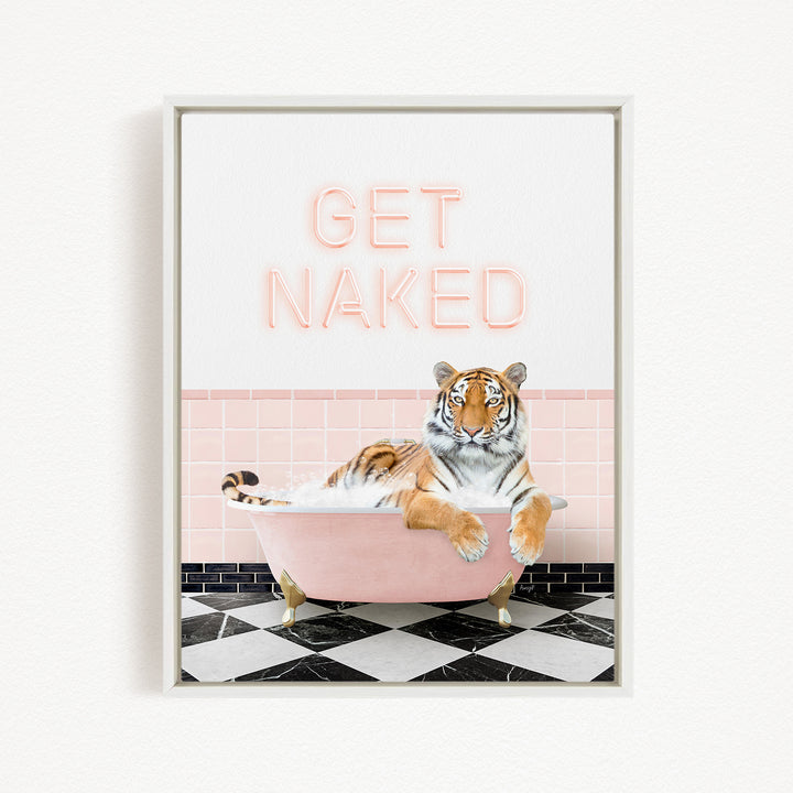 A tiger is sitting in a pink bathtub, with the text "GET NAKED" displayed above it.