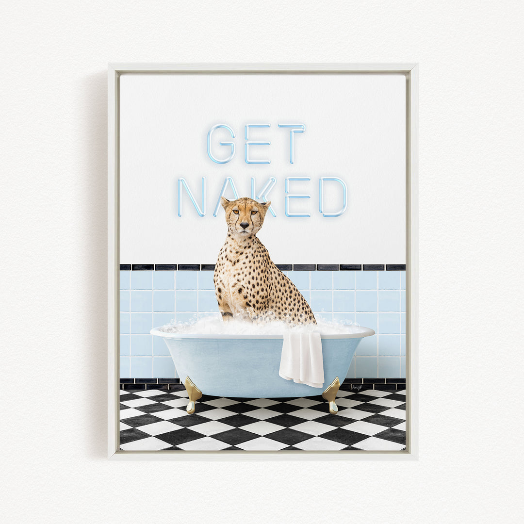 A cheetah sitting in a bathtub with a towel draped over its body, surrounded by a checkered floor and a wall with the text "GET NAKED" written on it.
