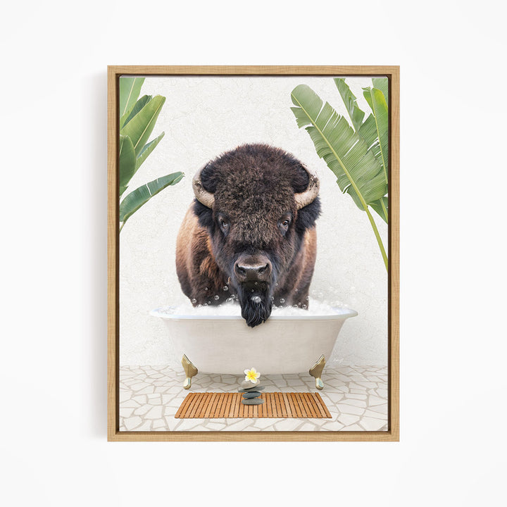A buffalo is sitting in a bathtub filled with water, surrounded by tropical plants and a wooden mat on the floor.