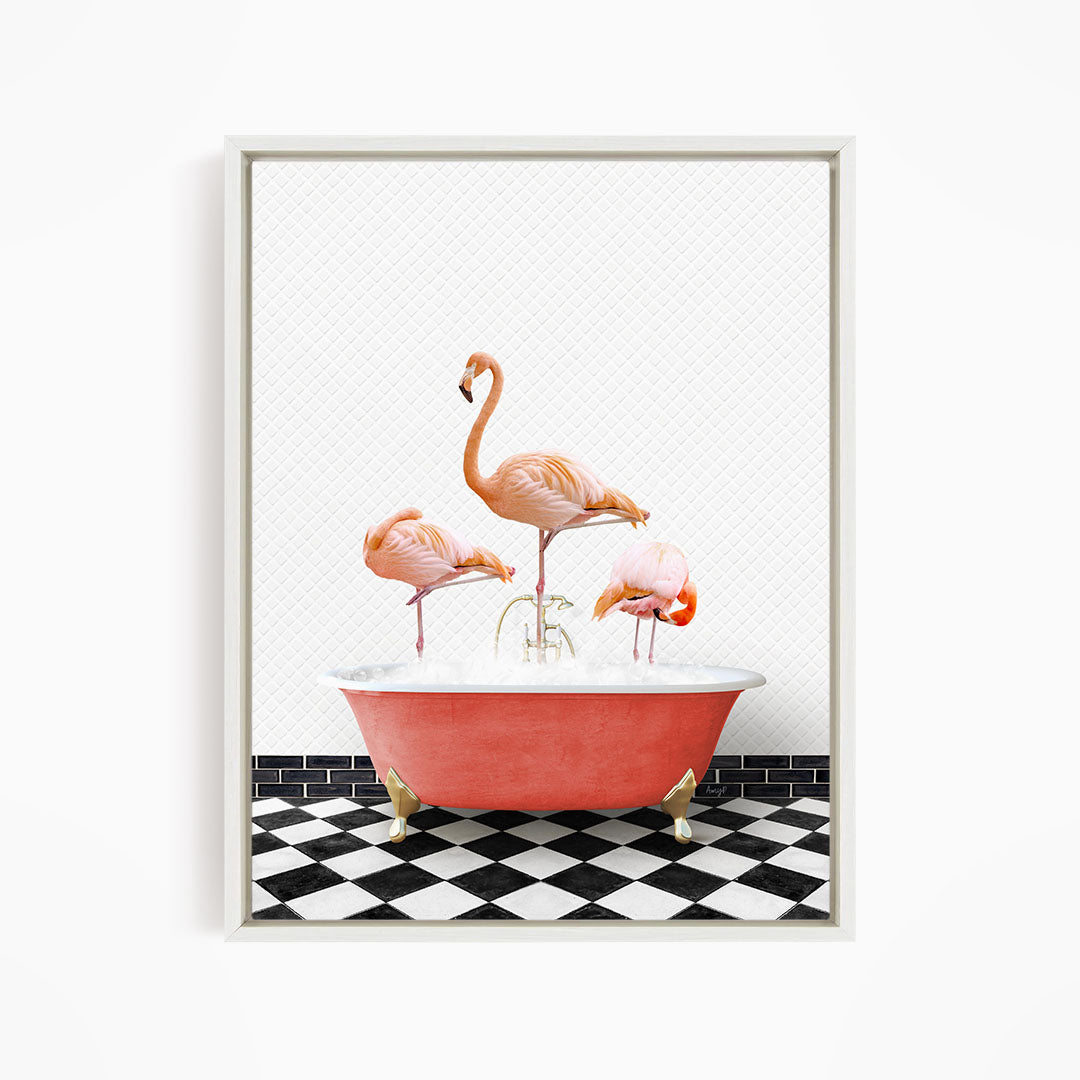 A framed image depicting three flamingos standing in a red bathtub on a black and white checkered floor.