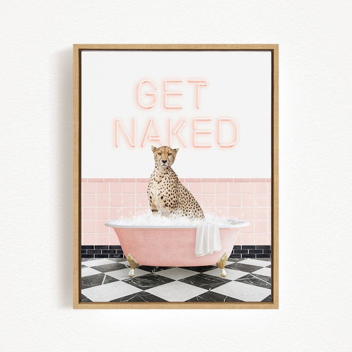 A cheetah sitting in a pink bathtub with the text "GET NAKED" displayed above it.