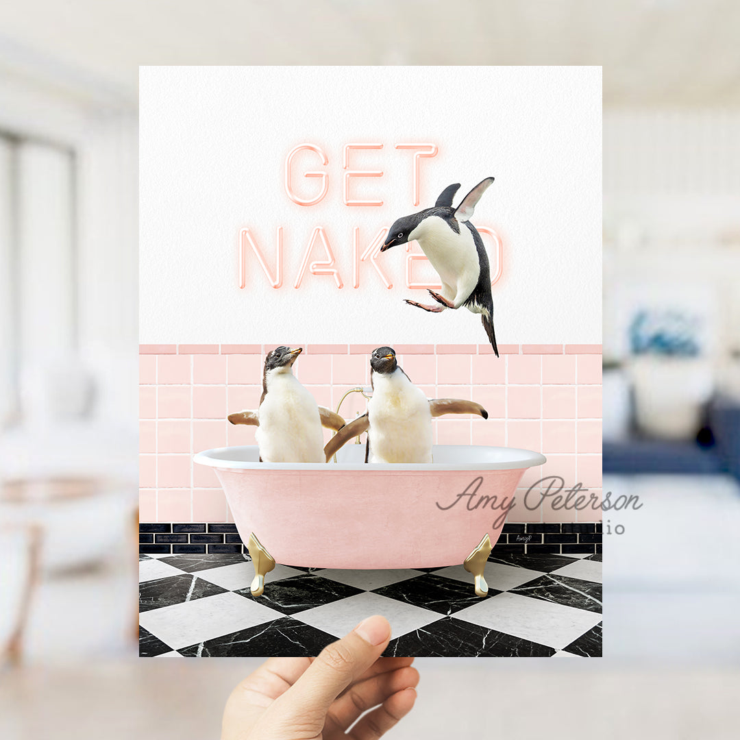 a person holding up a card with two penguins in a bathtub