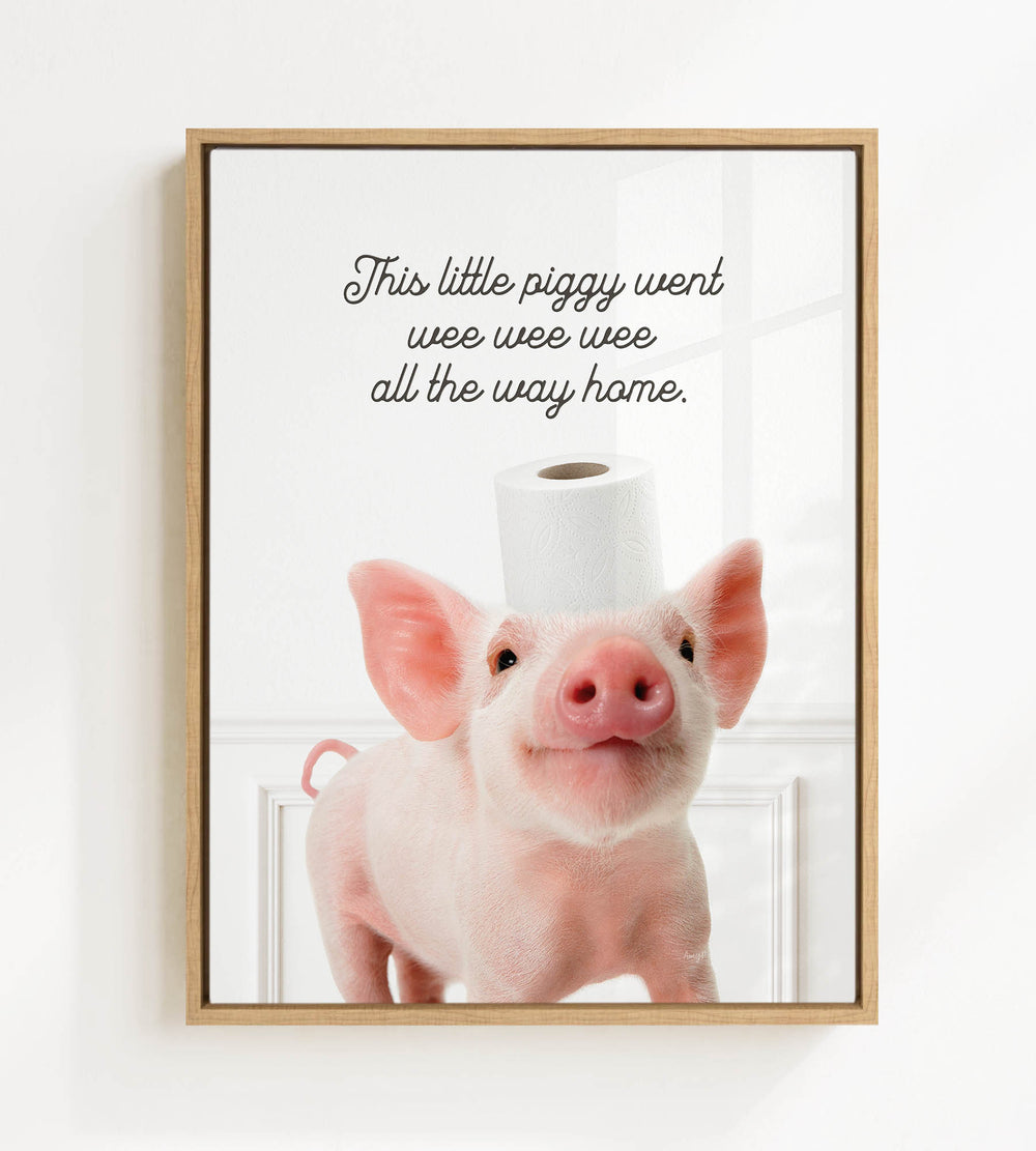 A cute pink pig standing on a white surface, with a roll of toilet paper on its head.