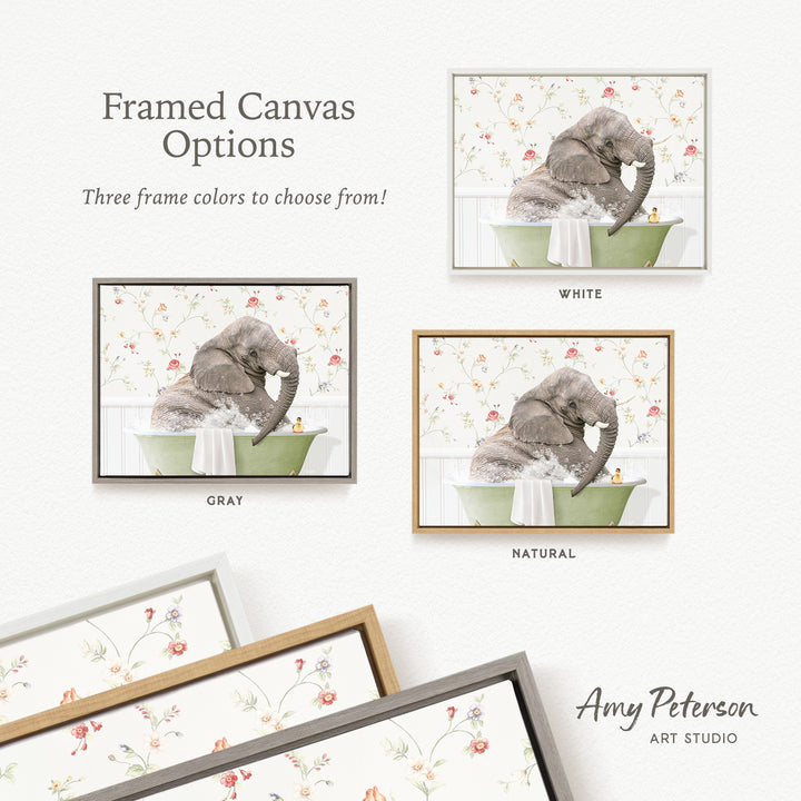 The image is a framed canvas with three different color options for the frame: white, gray, and natural. The canvas features a gray elephant sitting in a green bathtub, with a floral pattern on the wall behind it.