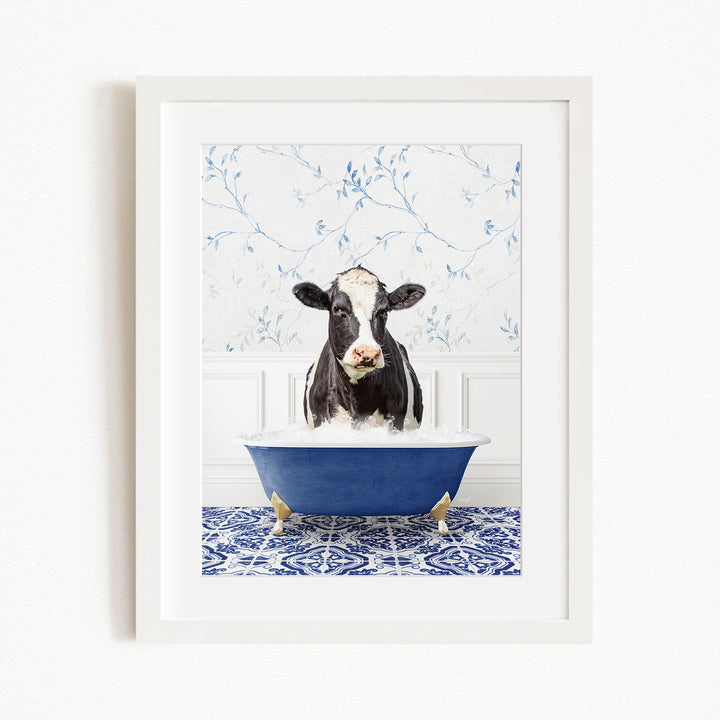 A black and white cow is standing in a blue bathtub filled with water, creating a whimsical and humorous scene.