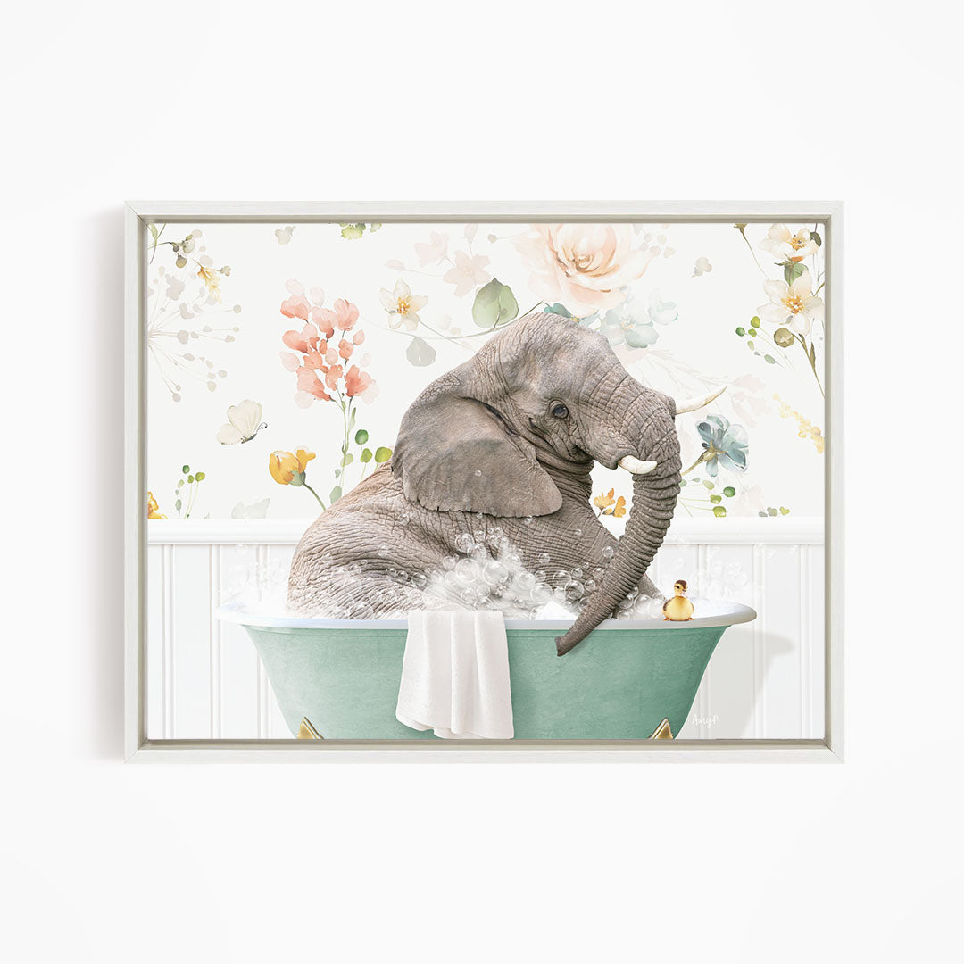 A gray elephant is sitting in a green bathtub filled with water, surrounded by a floral pattern.