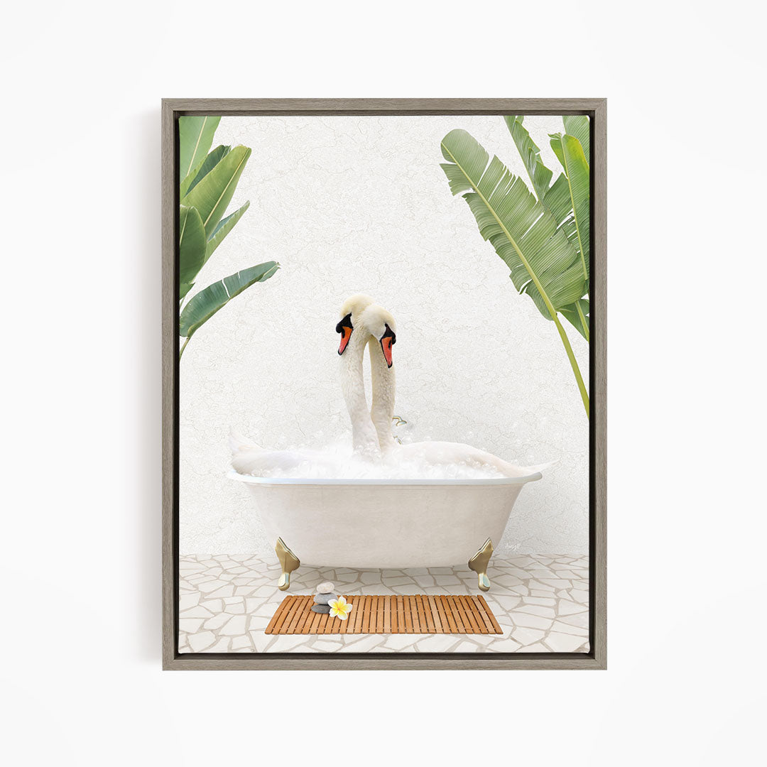 A pair of swans sitting in a white bathtub, surrounded by green leaves, creating a serene and relaxing scene.