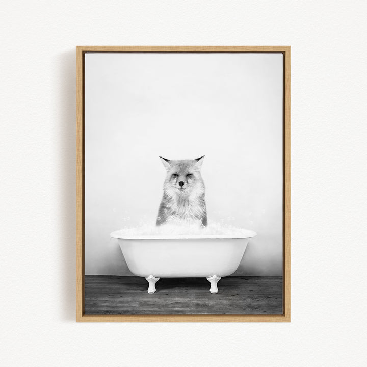 A cat sitting in a white bathtub filled with water, looking directly at the camera.