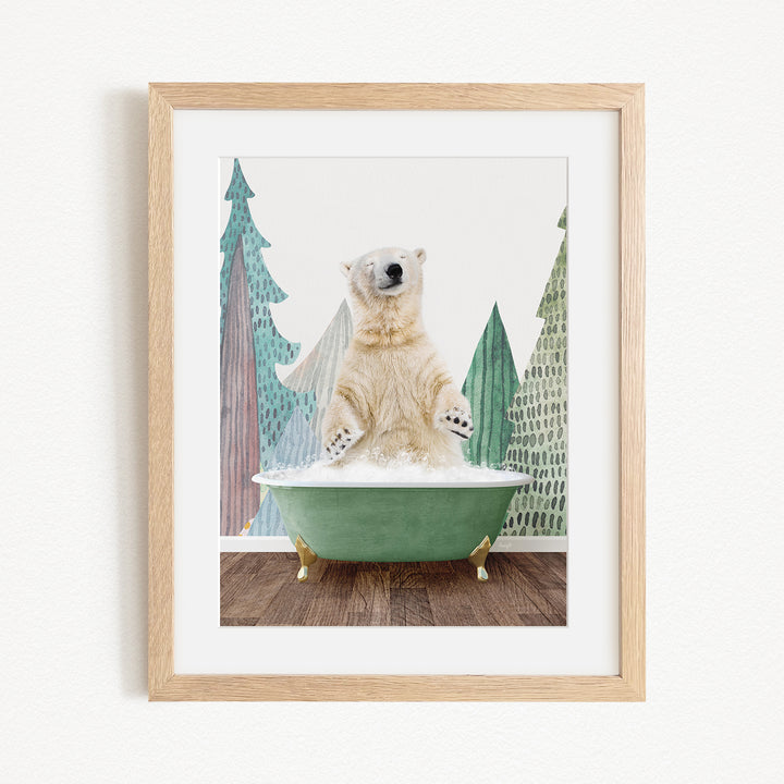 A polar bear is sitting in a green bathtub, surrounded by trees and a snowy landscape.