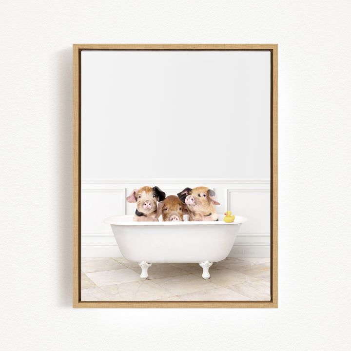 Three adorable pigs sitting in a white bathtub, with a yellow rubber duck floating in the water.
