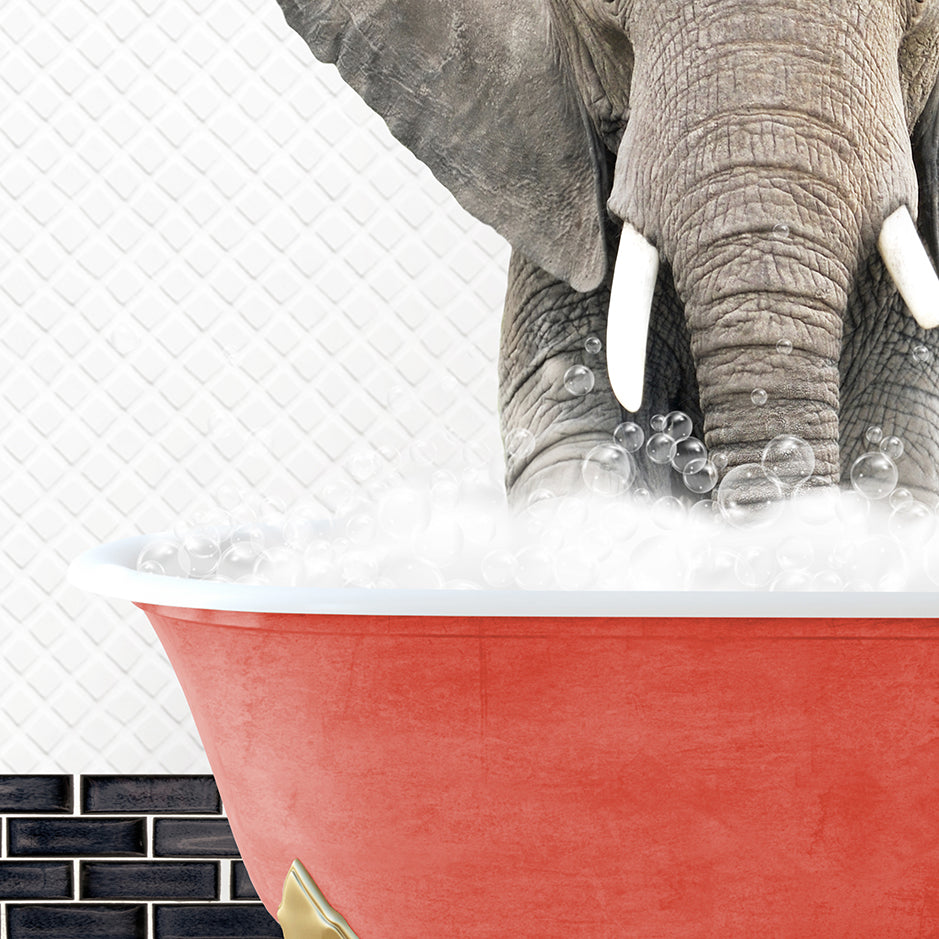 an elephant is taking a bath in a red bathtub