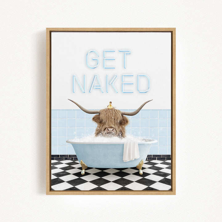 a horned animal, possibly a yak or a cow, sitting in a bathtub filled with bubbles, with the text "GET NAKED" displayed above it.
