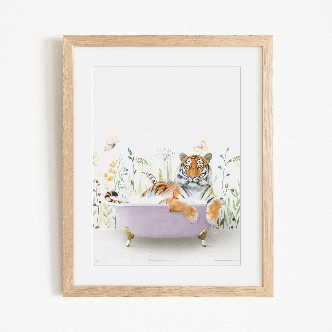 A tiger is sitting in a purple bathtub, surrounded by flowers and butterflies, in a framed artwork.