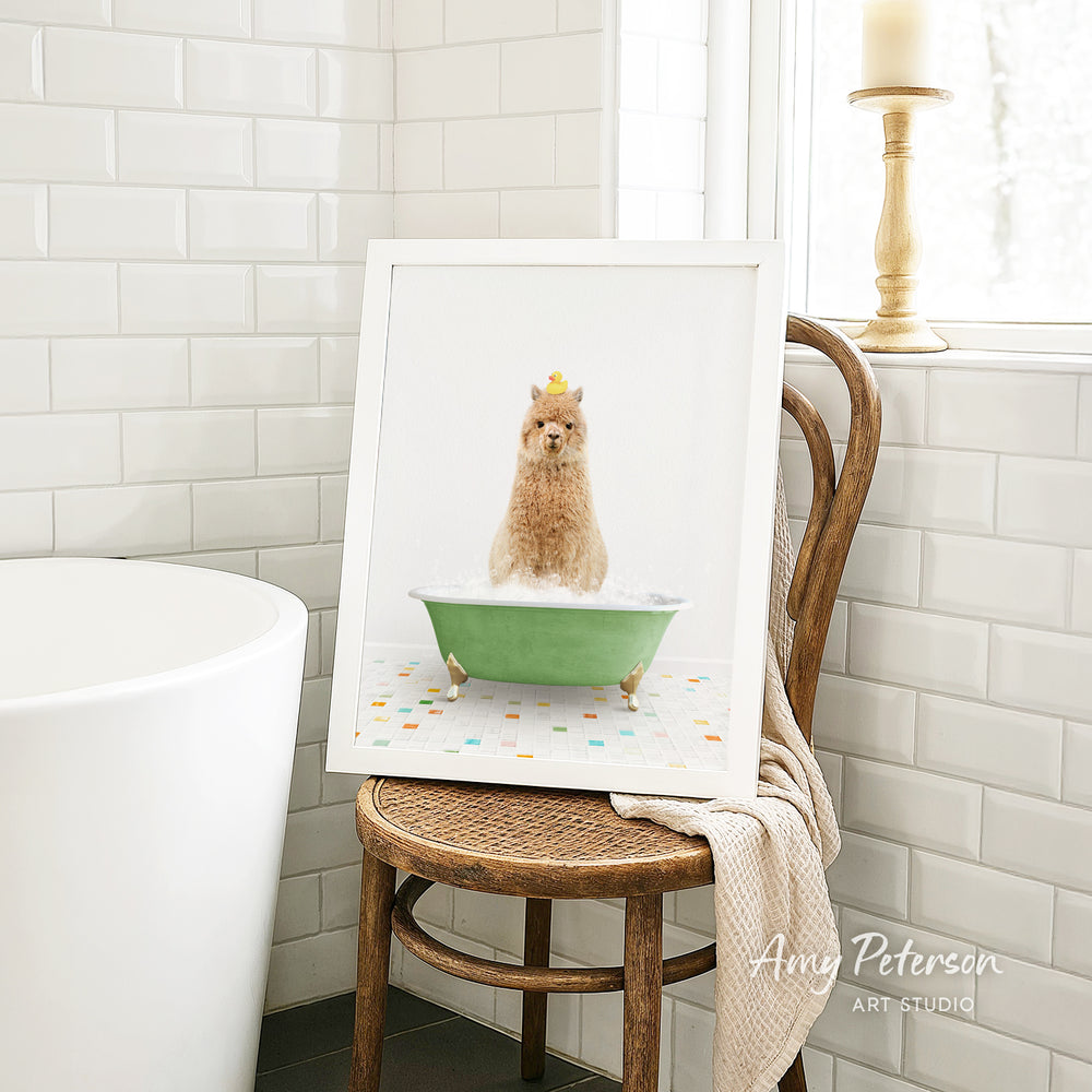 A framed image of a small dog sitting in a green bathtub filled with bubbles, with a yellow rubber duck on its head.